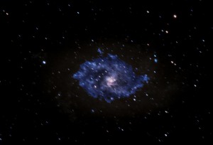 The Triangulum Galaxy is a spiral galaxy 2.73 million light-years from Earth in the constellation Triangulum. It is catalogued as Messier 33 or NGC 598.