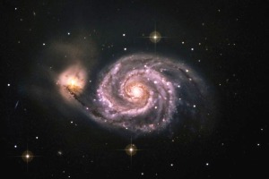 The Whirlpool Galaxy, also known as Messier 51a or NGC 5194, is an interacting grand-design spiral galaxy with a Seyfert 2 active galactic nucleus. It lies in the constellation Canes Venatici, and was the first galaxy to be classified as a spiral galaxy. It is 32 million light-years away and 109,000 ly in diameter.