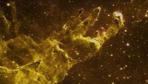 The "Pillars of Creation" refers to a prominent feature within the Eagle Nebula, a star-forming region located about 6,500 light-years away from Earth in the constellation Serpens