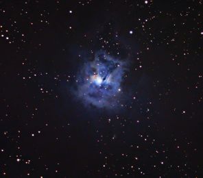 The Iris Nebula is a bright reflection nebula in the constellation Cepheus. The designation NGC 7023 refers to the open cluster within the larger reflection